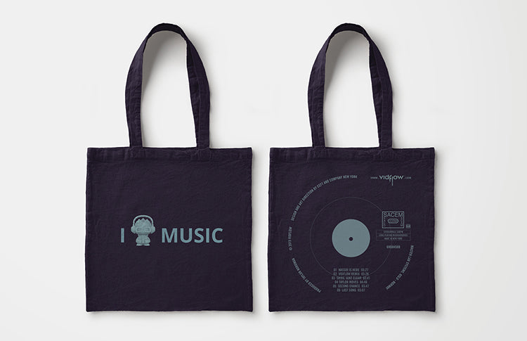 Two black tote bags with 'I Music' design on a white background